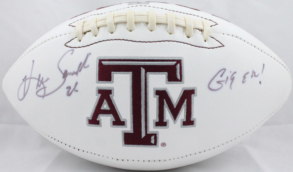 An autographed Hendolph White Aggie Game Football.